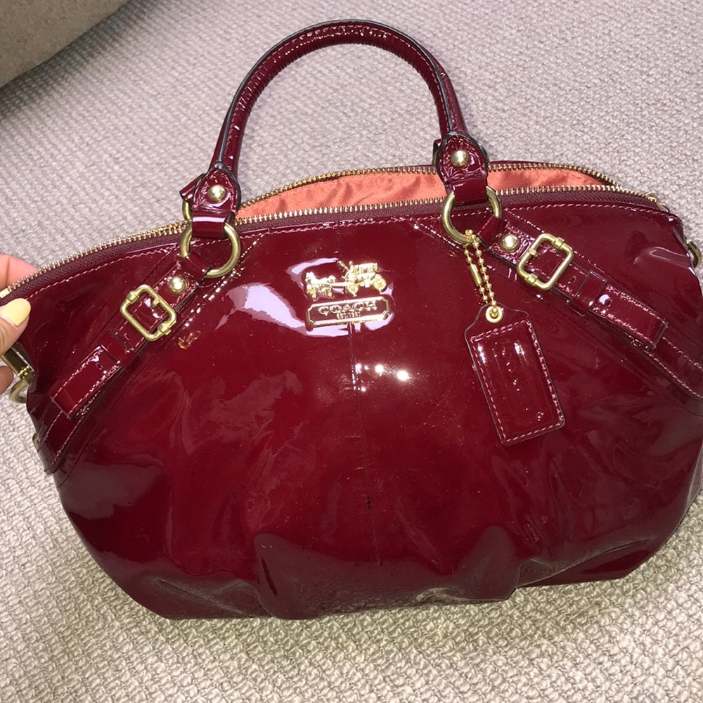 Red patent leather top handle coach bag